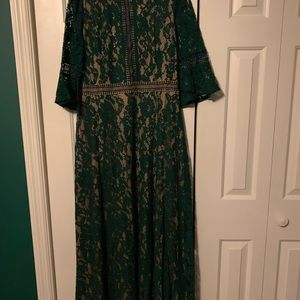 Long vintage formal lace gown with bell sleeves